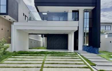 Imagem: A casa em condomínio possui 4 Dormitórios, 5 Banheiros, 4