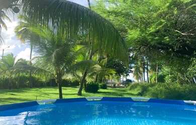 Imagem: A casa possui 5 Dormitórios, 4 Banheiros, 5 Vagas na garagem