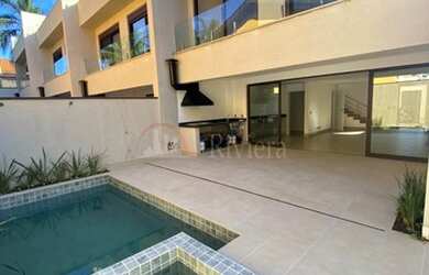 Imagem: A casa em condomínio possui 4 Dormitórios, 4 Banheiros, 2