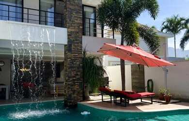 Imagem: A casa em condomínio possui 4 Dormitórios, 5 Banheiros, 4