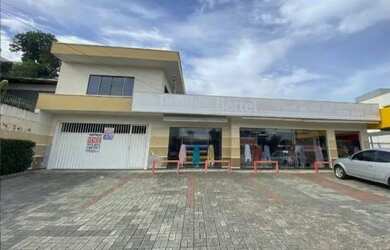 Imagem: A casa possui 2 Dormitórios e 3 Banheiros e está localizado