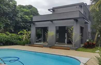 Imagem: A casa em condomínio possui 4 Dormitórios, 5 Banheiros, 4