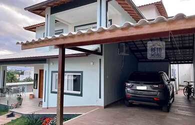 Imagem: A casa possui 3 Dormitórios, 5 Banheiros, 2 Vagas na garagem