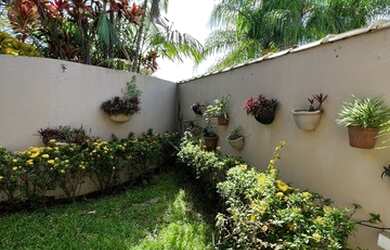 Imagem: A casa em condomínio possui 4 Dormitórios, 5 Banheiros, 2