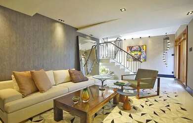 Imagem: A casa possui 3 Dormitórios, 2 Banheiros, 4 Vagas na garagem