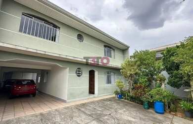 Imagem: A casa possui 5 Dormitórios, 2 Banheiros, 5 Vagas na garagem