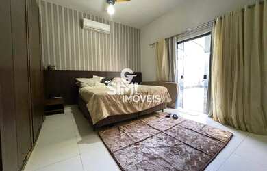 Imagem: A casa possui 4 Dormitórios, 3 Banheiros, 3 Vagas na garagem