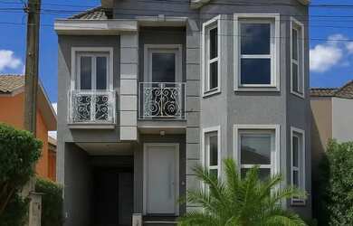 Imagem: A casa em condomínio possui 4 Dormitórios, 3 Banheiros, 5