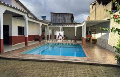 Imagem: A casa possui 2 Dormitórios, 2 Banheiros, 2 Vagas na garagem