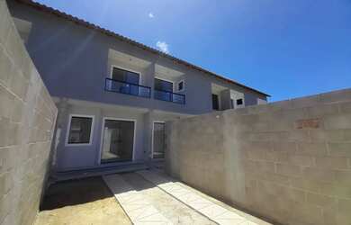 Imagem: A casa possui 3 Dormitórios, 2 Banheiros, 1 Vaga na garagem