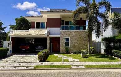 Imagem: A casa em condomínio possui 4 Dormitórios, 5 Banheiros, 4