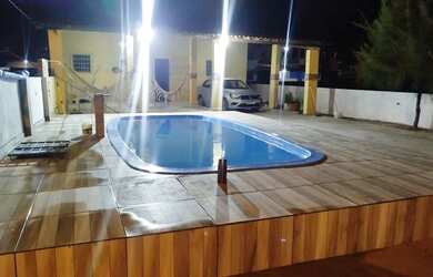 Imagem: A casa possui 3 Dormitórios, 3 Banheiros, 5 Vagas na garagem