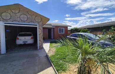 Imagem: A casa possui 5 Dormitórios, 2 Banheiros, 167m² de Área e