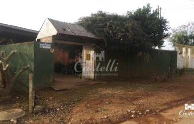 Imagem: A casa possui 3 Dormitórios, 1 Banheiro, 1 Vaga na garagem