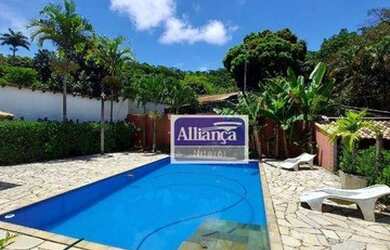 Imagem: A casa possui 3 Dormitórios, 2 Banheiros, 5 Vagas na garagem