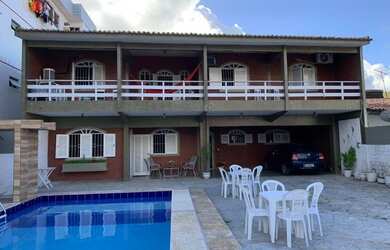 Imagem: A casa possui 5 Dormitórios, 4 Banheiros, 5 Vagas na garagem