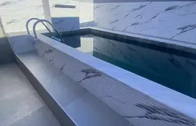 Imagem: A casa possui 3 Dormitórios, 2 Banheiros, 2 Vagas na garagem