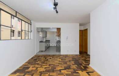 Imagem: O apartamento possui 3 Dormitórios, 1 Banheiro, 1 Vaga na garagem