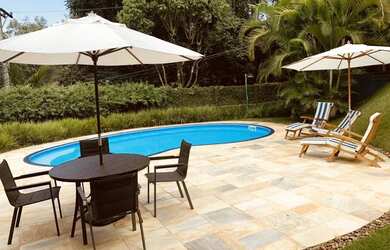 Imagem: A casa em condomínio possui 3 Dormitórios, 4 Banheiros, 4