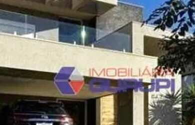 Imagem: A casa em condomínio possui 3 Dormitórios, 3 Banheiros e 318m²