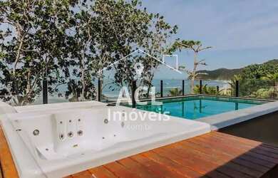 Imagem: A casa possui 5 Dormitórios, 5 Banheiros, 3 Vagas na garagem