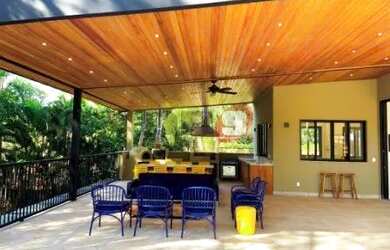 Imagem: A casa possui 5 Dormitórios, 5 Banheiros, 5 Vagas na garagem