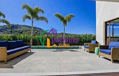 Imagem: A casa em condomínio possui 4 Dormitórios, 5 Banheiros, 4