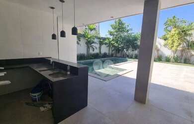 Imagem: A casa em condomínio possui 5 Dormitórios, 5 Banheiros, 4