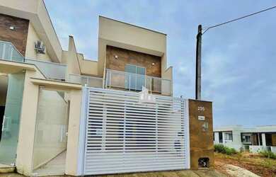 Imagem: A casa possui 3 Dormitórios, 1 Banheiro, 1 Vaga na garagem