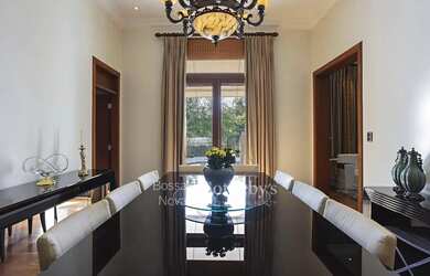 Imagem 9: Casa Clássica em Ponto Alto com Vista Deslumbrante