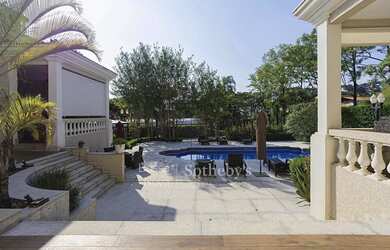 Imagem 15: Casa Clássica em Ponto Alto com Vista Deslumbrante