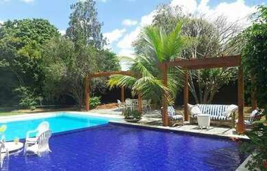 Imagem: A casa possui 5 Dormitórios, 5 Banheiros, 5 Vagas na garagem