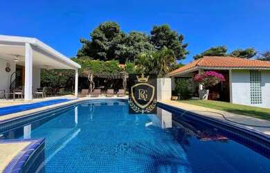 Imagem: A casa em condomínio possui 5 Dormitórios, 5 Banheiros, 4