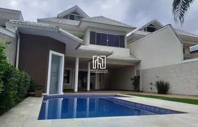 Imagem: A casa em condomínio possui 5 Dormitórios, 5 Banheiros, 5