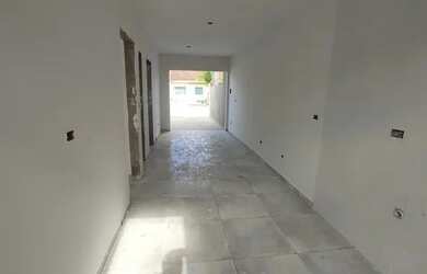 Imagem: A casa possui 2 Dormitórios, 1 Banheiro, 1 Vaga na garagem