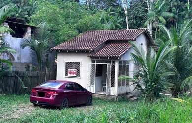 Imagem: A casa possui 2 Dormitórios, 1 Banheiro, 3 Vagas na garagem