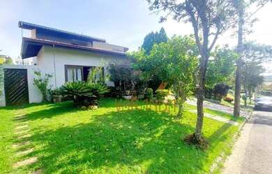 Imagem: A casa em condomínio possui 4 Dormitórios, 5 Banheiros, 4