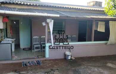 Imagem: A casa possui 2 Dormitórios, 1 Banheiro, 3 Vagas na garagem