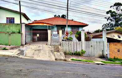 Imagem: A casa possui 3 Dormitórios, 1 Banheiro, 1 Vaga na garagem