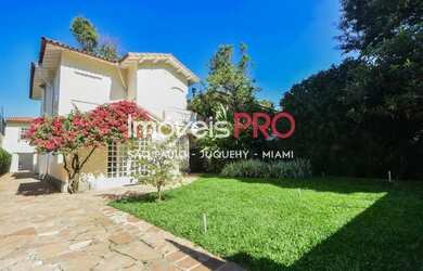 Imagem: A casa possui 3 Dormitórios, 4 Banheiros, 3 Vagas na garagem