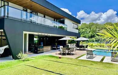 Imagem: A casa em condomínio possui 4 Dormitórios, 5 Banheiros, 4