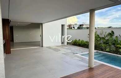 Imagem: A casa possui 3 Dormitórios, 5 Banheiros, 5 Vagas na garagem