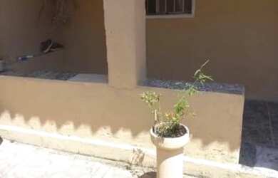 Imagem: A casa possui 3 Dormitórios e 2 Banheiros e está localizado