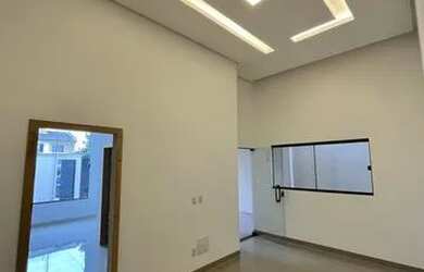 Imagem: A casa possui 3 Dormitórios, 2 Banheiros, 3 Vagas na garagem