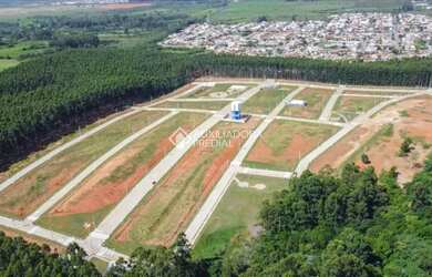 Imagem: O terreno possui 200m² de Área, Imóvel novo e está localizado