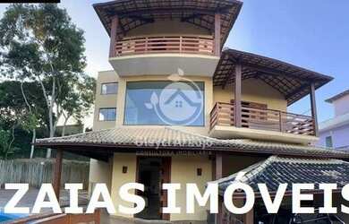 Imagem: A casa possui 3 Dormitórios, 5 Banheiros, 3 Vagas na garagem