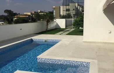 Imagem: A casa em condomínio à venda possui 4 Dormitórios, 5 Banheiros