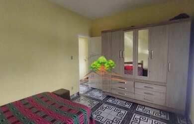 Imagem: A casa possui 3 Dormitórios, 1 Banheiro, 2 Vagas na garagem