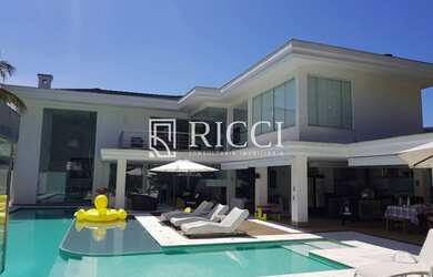 Imagem 1: CASAGUARUJÁ. Piscina, Churrasqueira, Ar-condicionadoeLareira