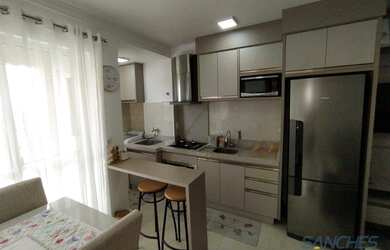 Imagem: O apartamento possui 2 Dormitórios, 1 Banheiro, 1 Vaga na garagem